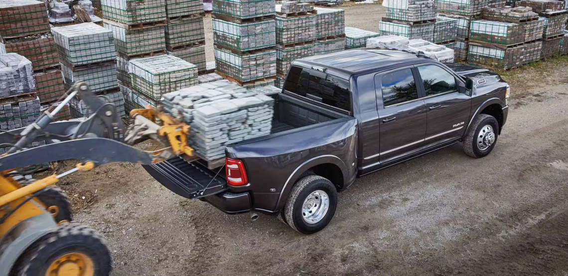 Loading used RAM trucks at the worksite