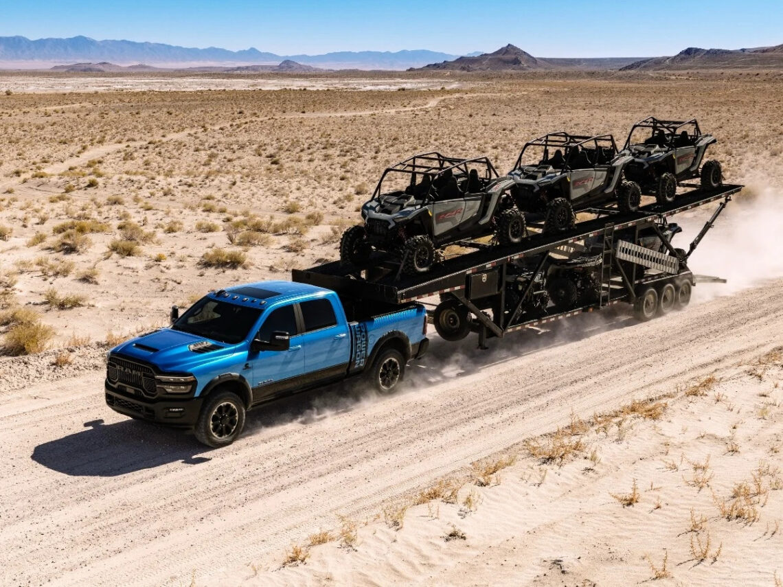2027 RAM 2500 Power Wagon towing a set of UTVs